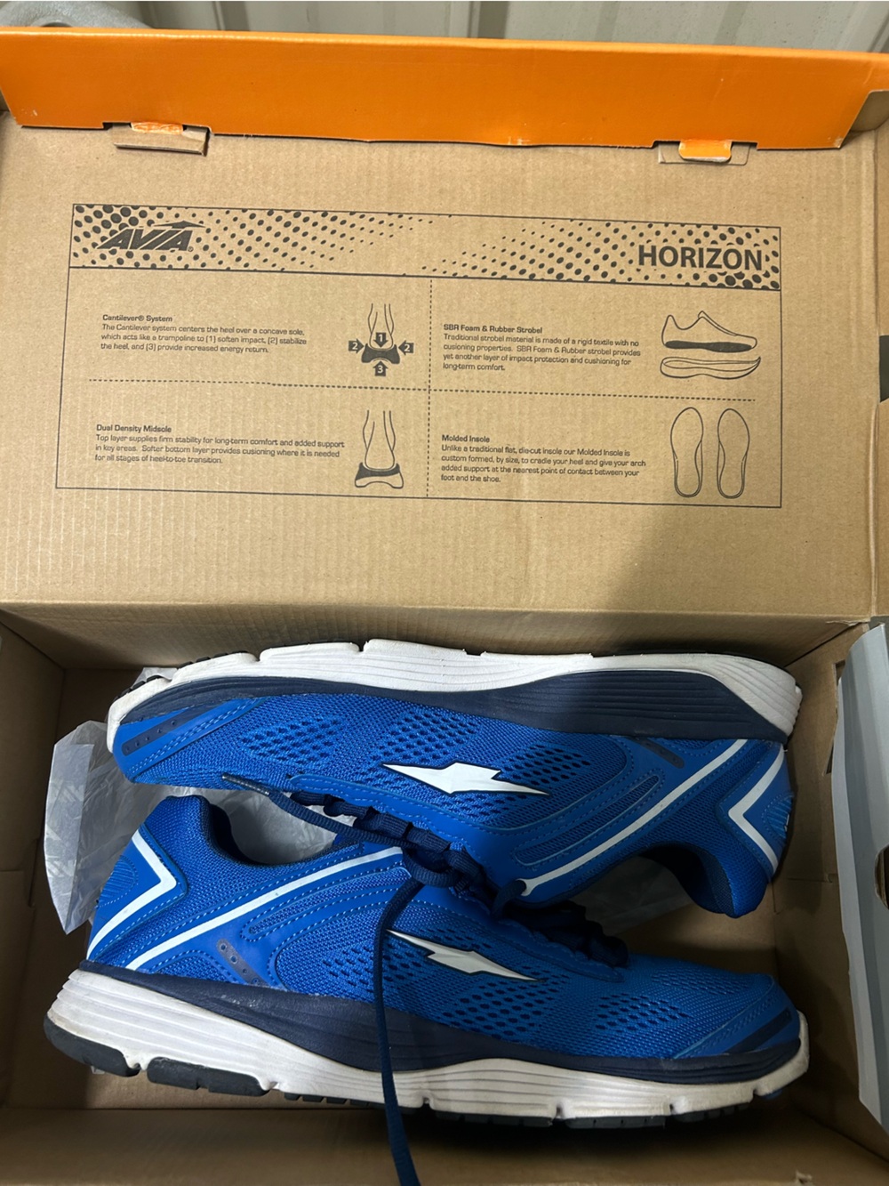 Men’s size 10 1/2 royal blue tennis shoes tie up with white shoe strings.